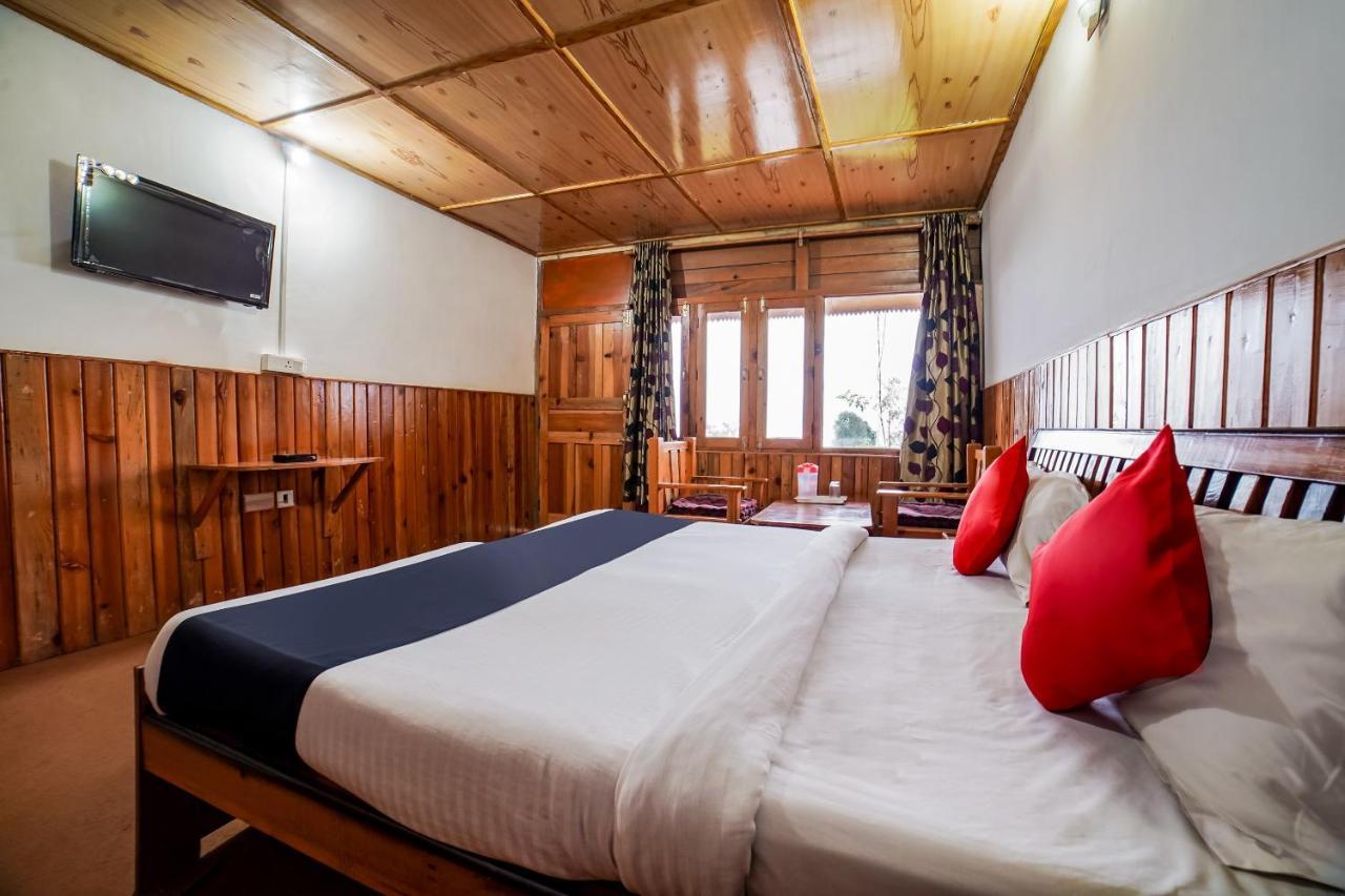 Capital O 47240 Hotel Blossom Resort Kausani Extérieur photo